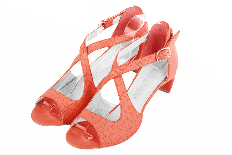Coral orange women's closed back sandals, with crossed straps. Round toe. Low comma heels. Front view - Florence KOOIJMAN